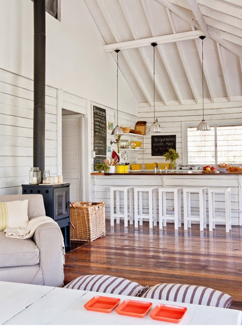 ESTILO RUSTICO: Cabana de Madera en el Tigre