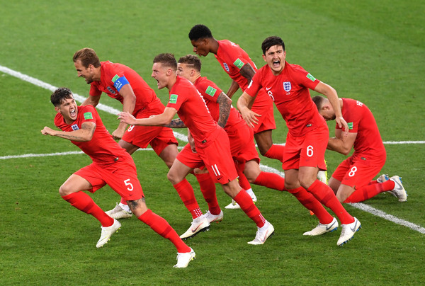 England players (l-r John Stones, Harry Kane, Jamie Vardy, Kieran Trippier, Marcus Rashford, Harry Maguire, Jordan Henderson) celebrate after Eric Dier of England scores the winning penalty during the 2018 FIFA World Cup Russia Round of 16 match between Colombia and England at Spartak Stadium on July 3, 2018 in Moscow, Russia.