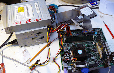 old computer motherboard on the test bench