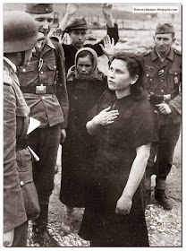 German soldiers listen carefully  Russian lady  saying. Novorossiysk, 1942 Rare WW2 Images