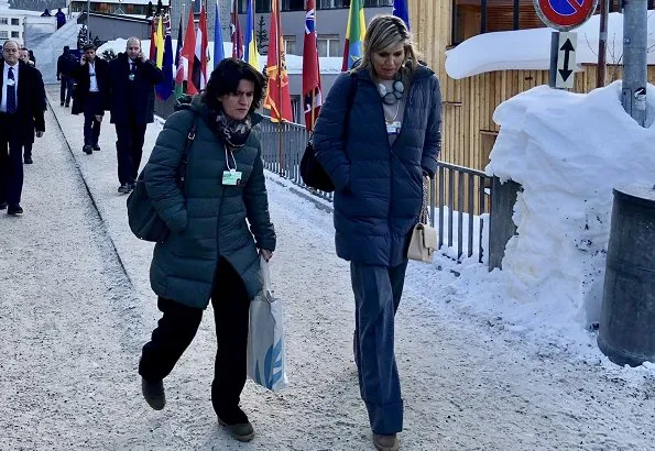 Queen Maxima wore Natan Top and trousers from Fall Winter 2019 collection. Natan red blouse and red pants