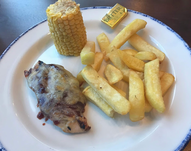 Child main meal BBQ chicken, chips and corn cob 