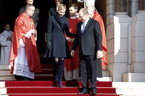 Prince Albert II of Monaco  and Princess Charlene leave the Monaco Cathedral after the Sainte Devote festivities in Monaco