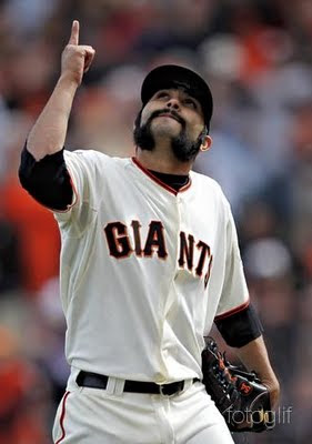an Francisco Giants' Sergio Romo walks off the field during his MLB National League baseball game against the St. Louis Cardinals in San Francisco, California, April 8, 2011. REUTERS/Beck Diefenbach