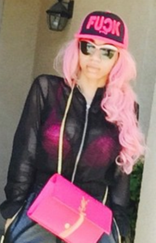 000 Photo: Dencia, her pink hair and pink bra step out looking stunning