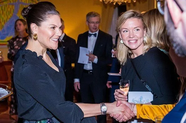 Governor of Norrbotten Björn O. Nilsson and his wife Helena Nilsson Brink. Crown Princess Victoria wore a black floral print skirt