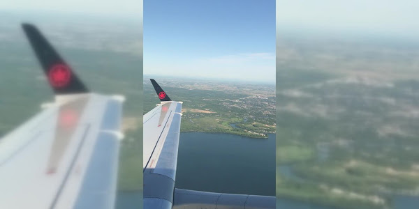 A screenshot of a vertical video with blurred pillarbox