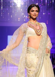 Deepika Padukone in white dress wearing jewels