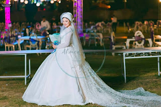  مجموعة من افخم فساتين الزفاف والسواريه لمصمم الازياء احمد رجب 