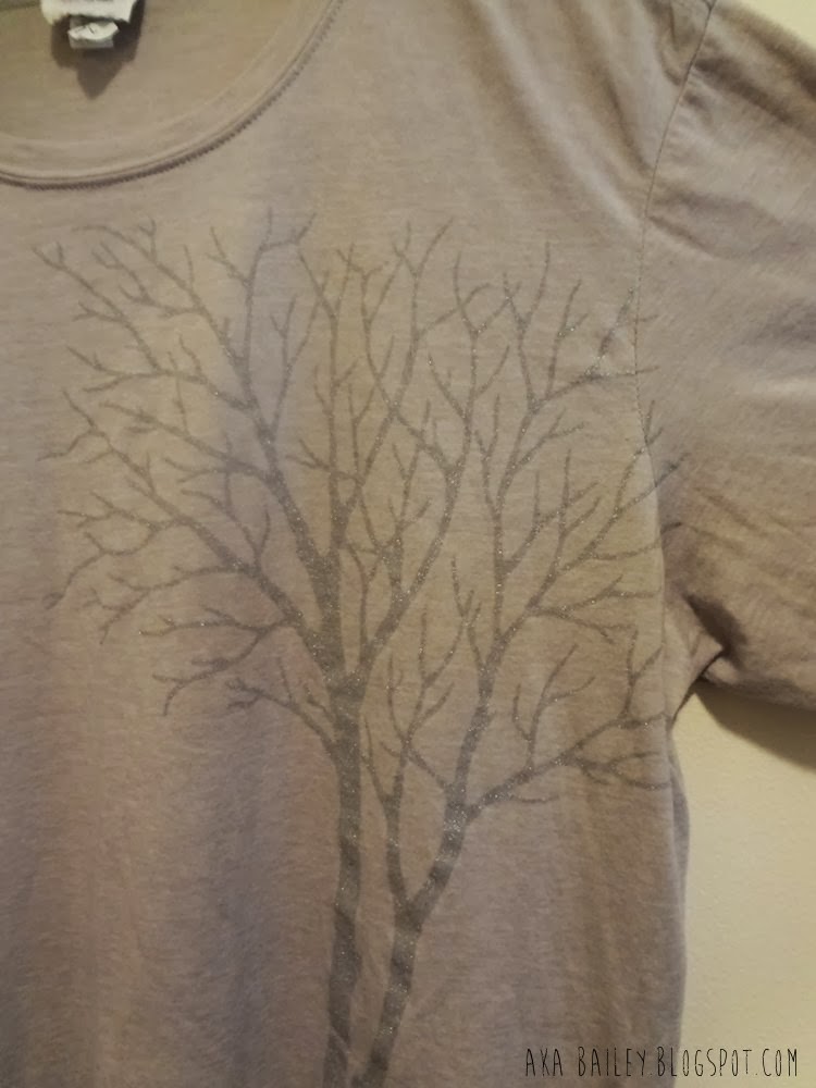 Close up of tree graphic on a Belvedere Vodka t-shirt
