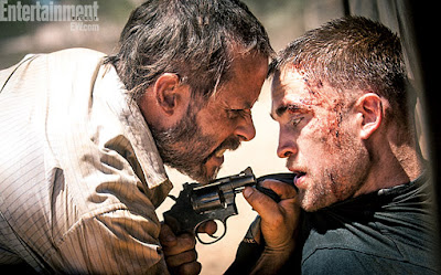 Guy Pearce and Robert Pattinson in The Rover
