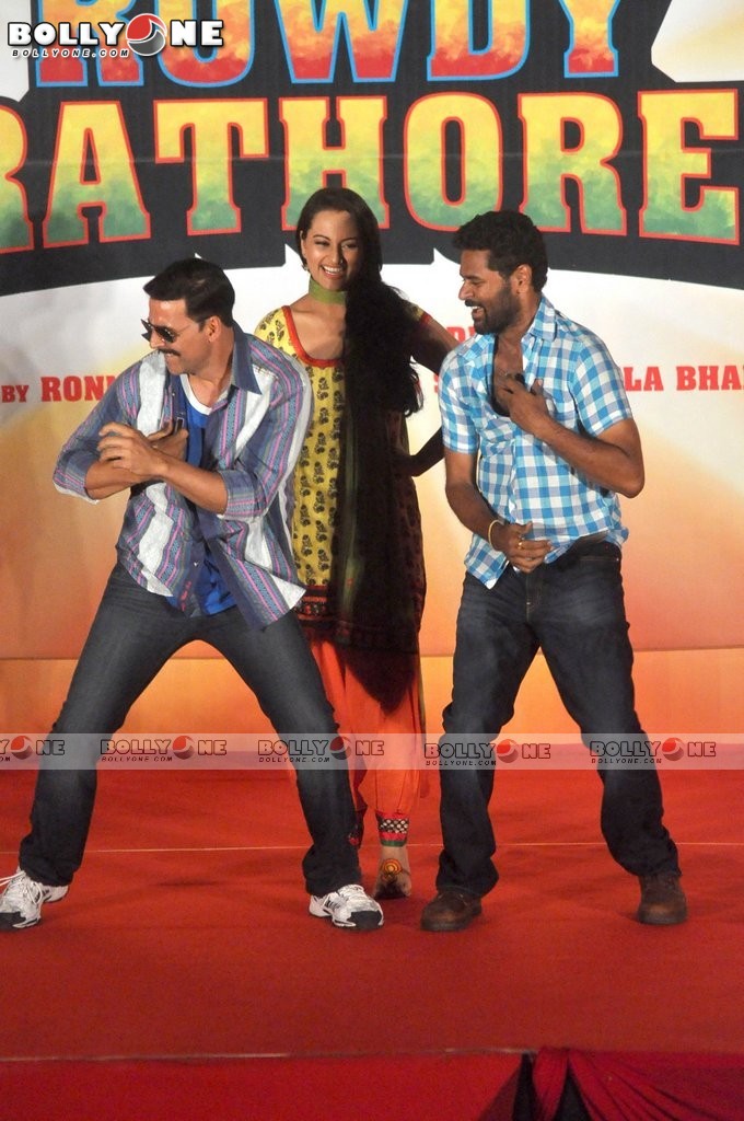  Sonakshi sinha in yellow suit kameez, orange salwaar -  Sonakshi sinha Yellow Suit Rowdy Rathore First look launch 