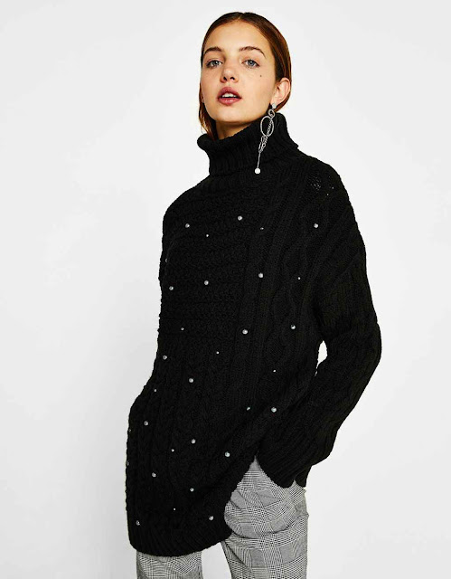 black knit jumper with pearls