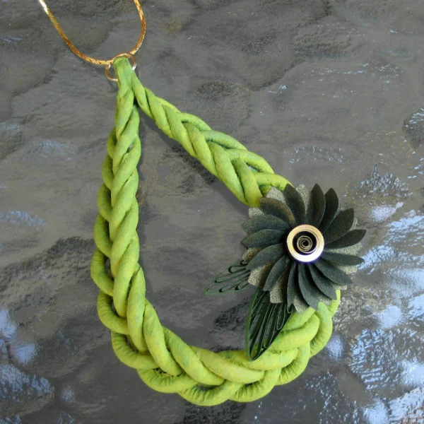 Lime green loosely braided Makigami Pendant with an olive green paper sculpture flower on a golden neckace chain