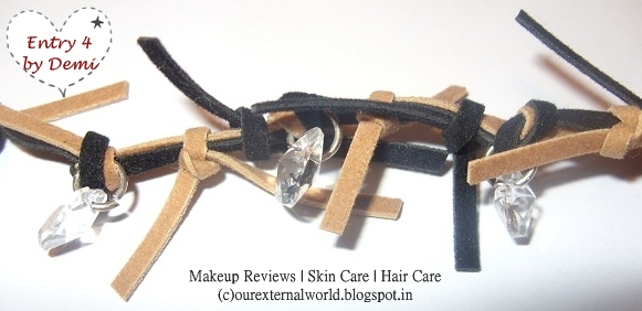 Knotted Leather Straps With Swarovski Crystals Hung Using Metal Rings Knotted Leather Straps With Swarovski Crystals Hung Using Metal Rings