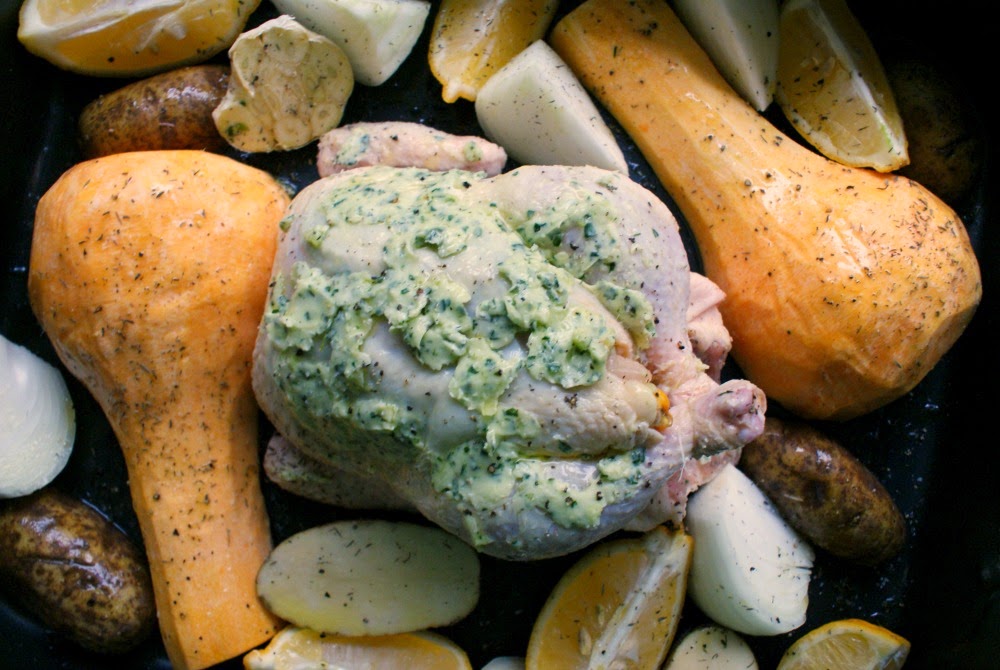 Roast Lemon Chicken with Garlic and Herbs before roasting in the oven.