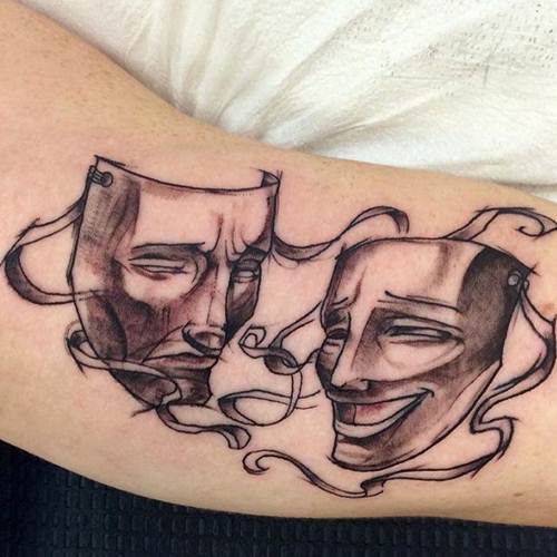 10 Dramatic Theatre Mask Tattoos