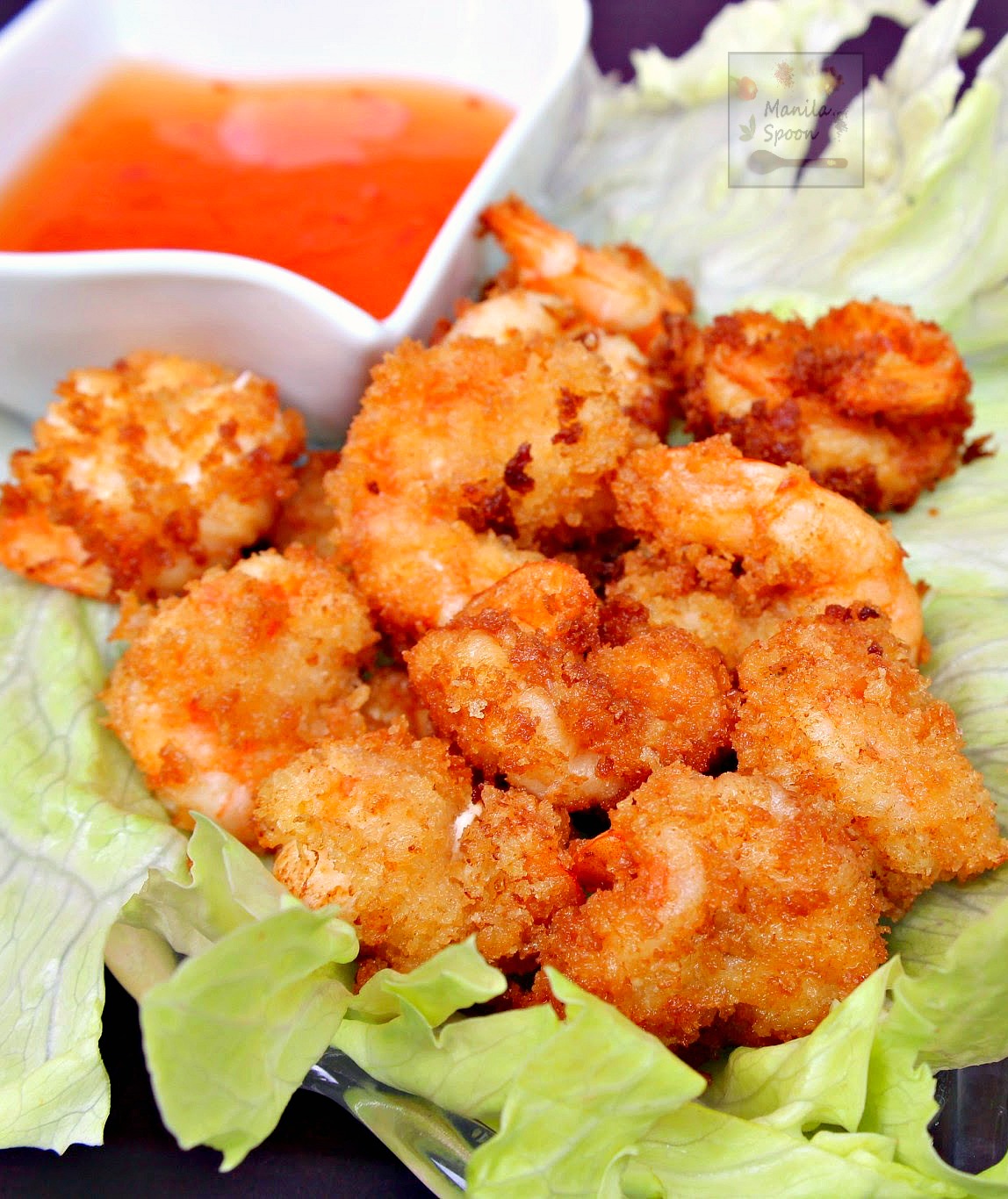 Camaron Rebosado is a citrus-marinated battered shrimp served with a sweet sour sauce and is the Filipino version of tempura. Cruncy-licious and flavorful, it's a great appetizer and a sure crowd-pleaser! | manilaspoon.com