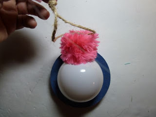 Recycled light bulb ornament for breast cancer awareness