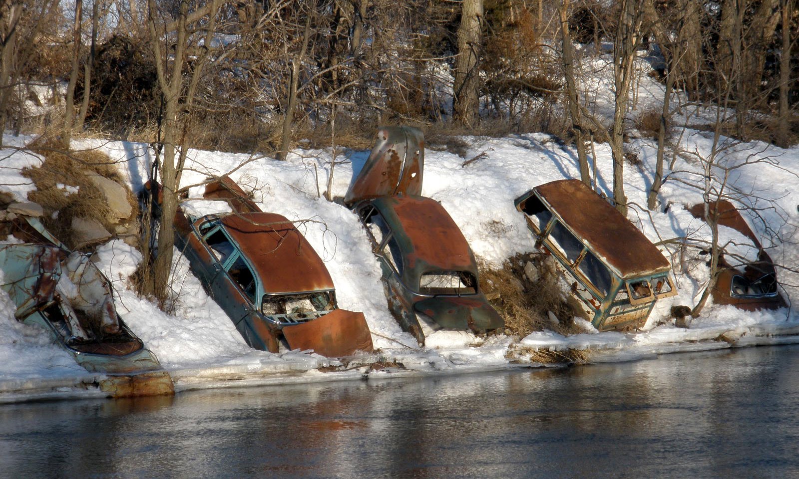 Just A Car Guy lining rivers with junkyard cars to stop erosion, very