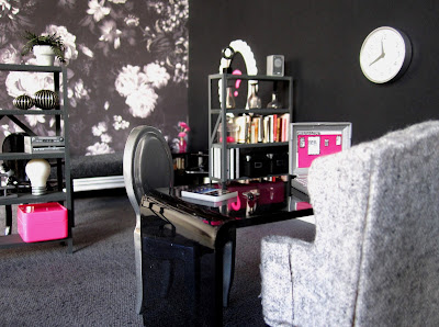 One-twelfth scale modern miniature office scene in shades of black, grey and hot pink.