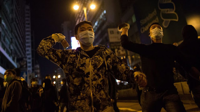 Hong Kong fire raid: 48 policemen injured in riots