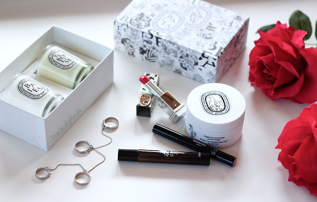 Diptyque candles flatlay beauty Diptyque beauty flatlay with lipstick and jewelry