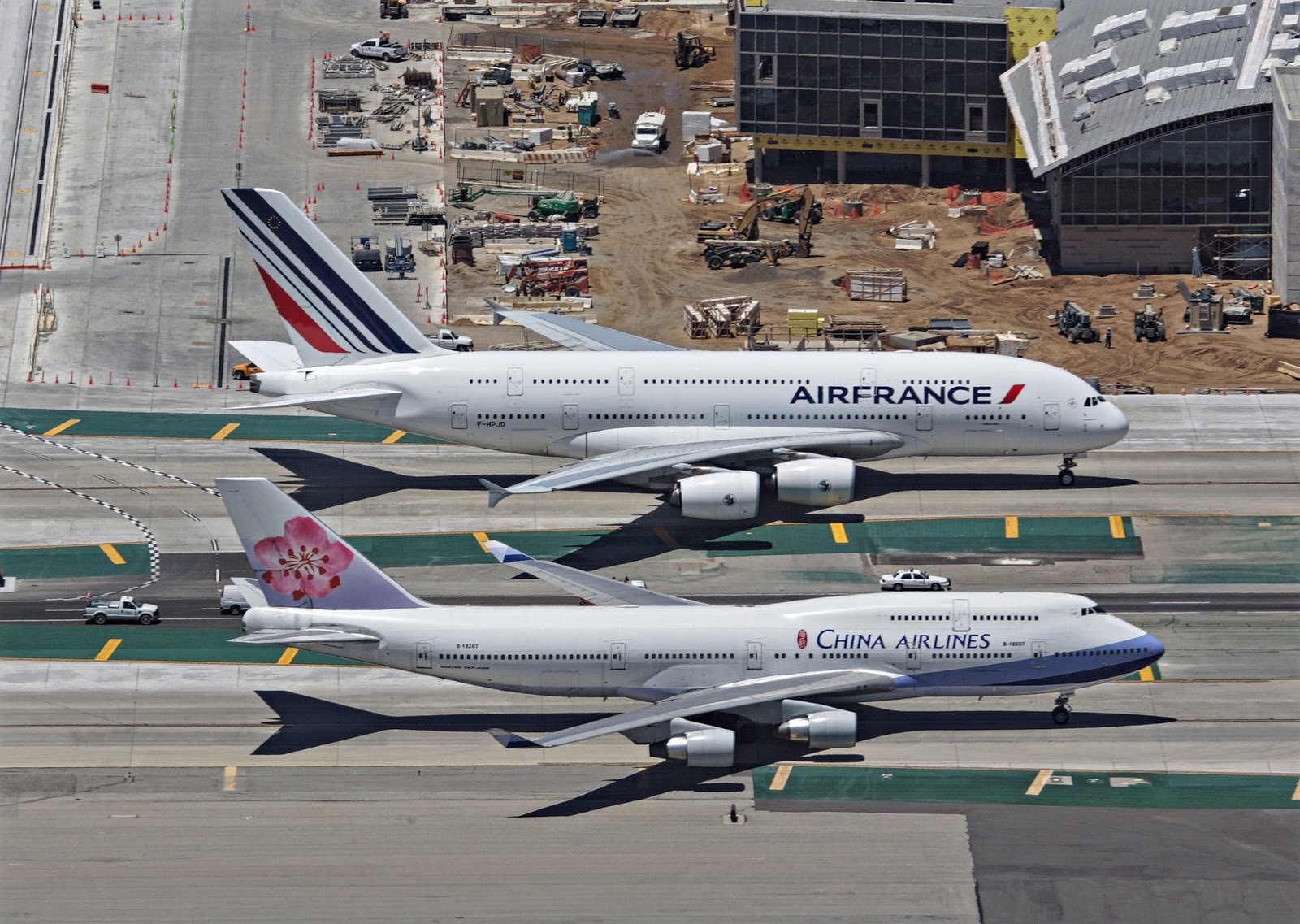 Airbus A380 And Boeing 747 Size Comparison On Runway