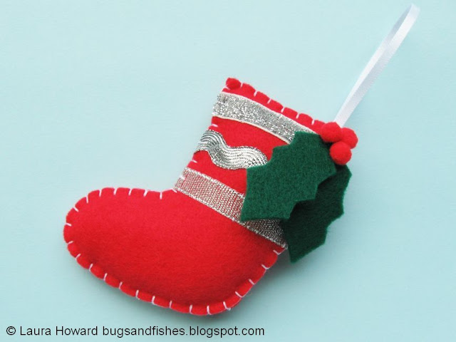 Use felt and ribbon to make this cute stripey stocking ornament for your Christmas tree felt stocking ornament