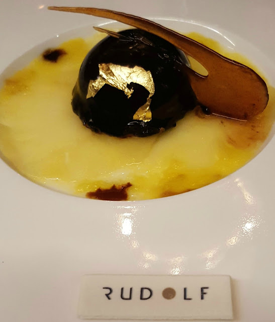 10 Karaköy Istanbul Rudolf 74% Chocolate Cheesecake with Pineapple Capaccio Marinated in Orange Bitter 