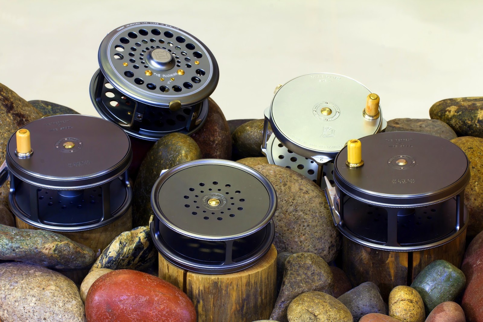 click and pawl fly reel