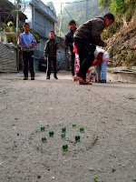 Children playing marbles in Darjeeling