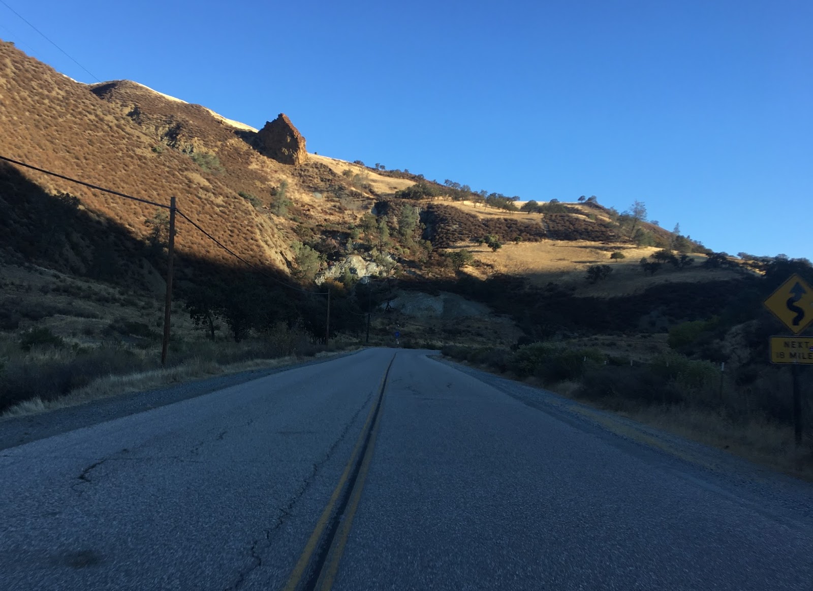 Signed County Route J1 and former California State Route 180 on Panoche
