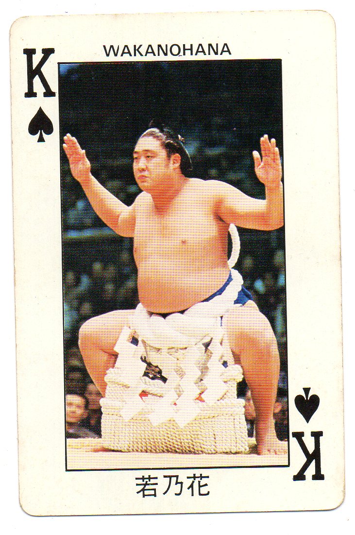 Ikezuki Goatazaemon next to a print of his hand, The sumo wrestler Ikezuki  Goatazaemon, with bare torso, depicted next to a full-size representation  of his hand. The text states that he came