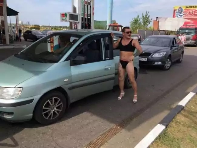 Russian Gas Station Offers Free Fuel For Those Wearing Bikini, And Men Accepted The Challenge