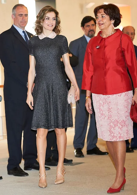Queen Letizia attends opening of the exhibition the Recognizing the Spanish Heritage in Europe at the COAM in Madrid. Queen letizia wears Magrit shoes, Felipe Varela dress and clutch bag