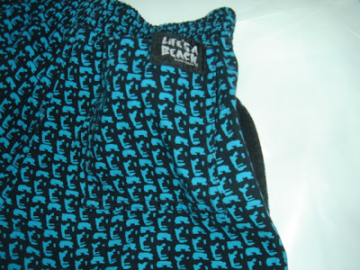 右ヒップ ロゴパッチ付きポケット