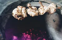 Cooking chicken kalmi kebab over charcoal Tandoor food Recipe Dinner ideas