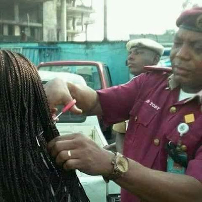 D Photos: FRSC Rivers state commander cuts off hair extensions of female members