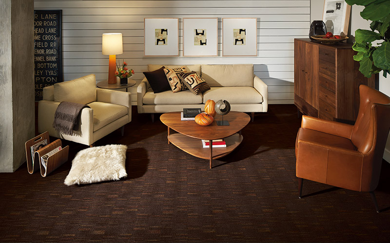 Brown patterned carpet is a great way to tie this room together