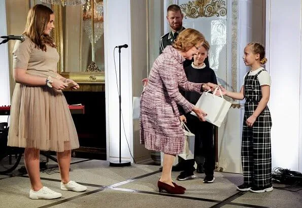 Princess Ingrid Alexandra wore Cathrine Hammel midi tulle skirt and Cathrine Hammel petit merino top. Queen Sonja