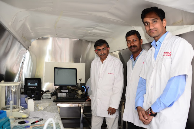 Dabur India Ltd R&D Head Dr J L N Sastry inside the Dabur Mobile Honey Testing Van
