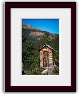 Colorado outhouse photo, of a primitive rustic privy located in the alpine ghost town of Independence, Colorado.