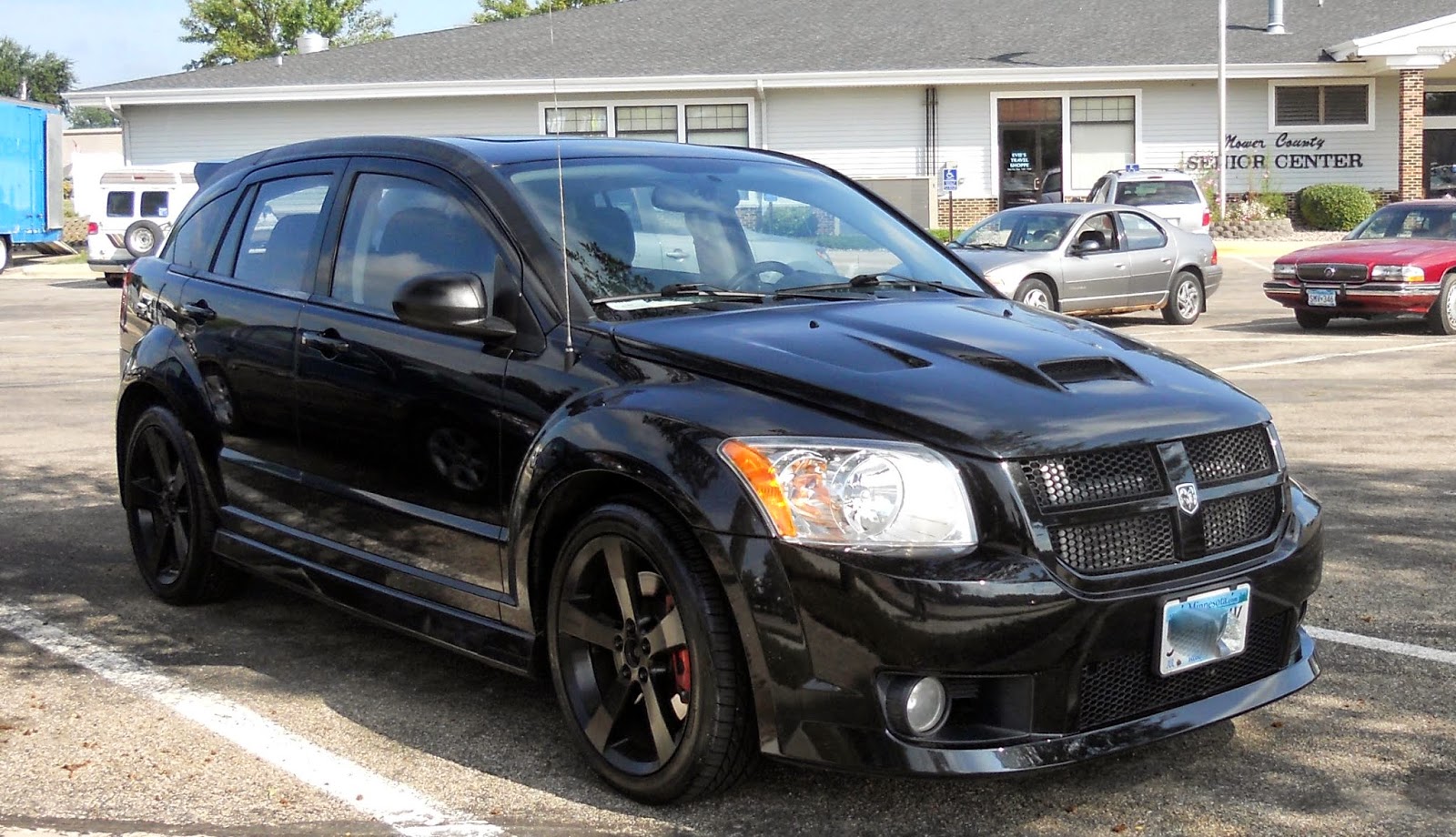 AutomoZeal: Dodge Caliber SRT-4 vs 1991 Mustang LX 5.0 in a senior