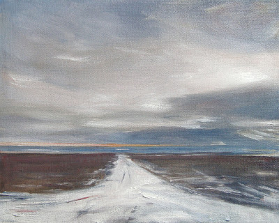 snowy road leading to the bay, dramatic sky