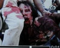 صور القذافي بعد مقتله