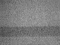 Eski televizyonlarda sinyal olmaması nedeniyle meydana gelen karlama