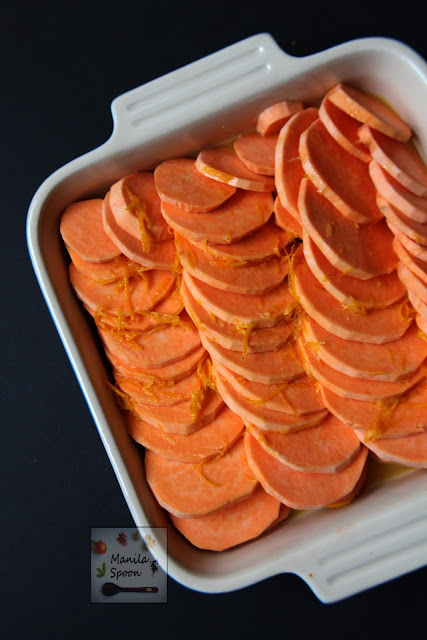 Flavored with honey and orange juice then studded with pecans this tasty Candied Sweet Potato Casserole is the perfect side dish for Thanksgiving. | manilaspoon.com