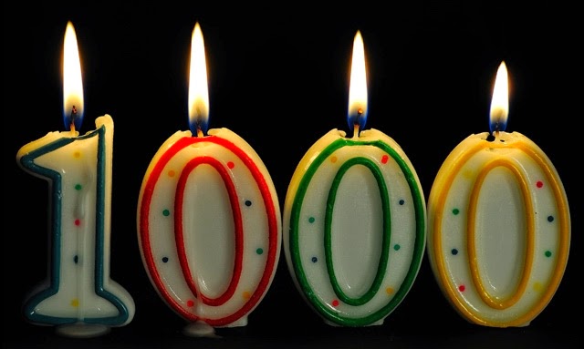 "1000" in number shaped candles, lit