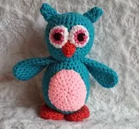 http://www.ravelry.com/patterns/library/hooty-the-baby-owl
